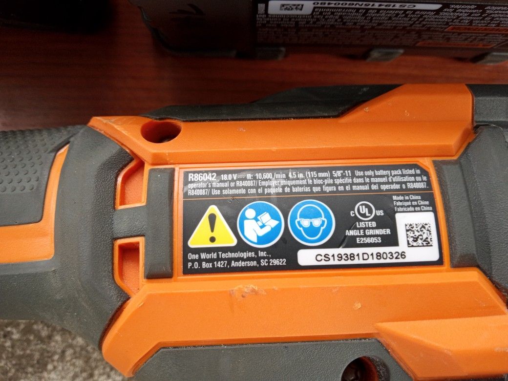 Ridged Drill /. Angel Grinder/ Charger 2 18 V Bats/ 2 Octane Battery