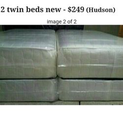 Two twin beds new can deliver