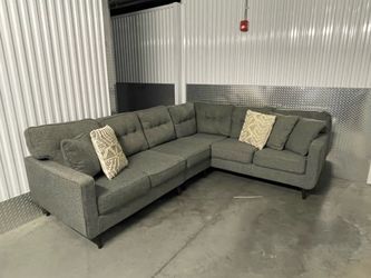 Gray sectional 113” x 90”