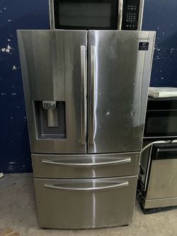 Four door stainless steel refrigerator