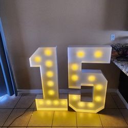 4ft tall numbers one and five (15) marqui Numbers 
