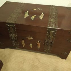 Vintage Chinese camphor chest with soapstone inlay and brass fixtures
