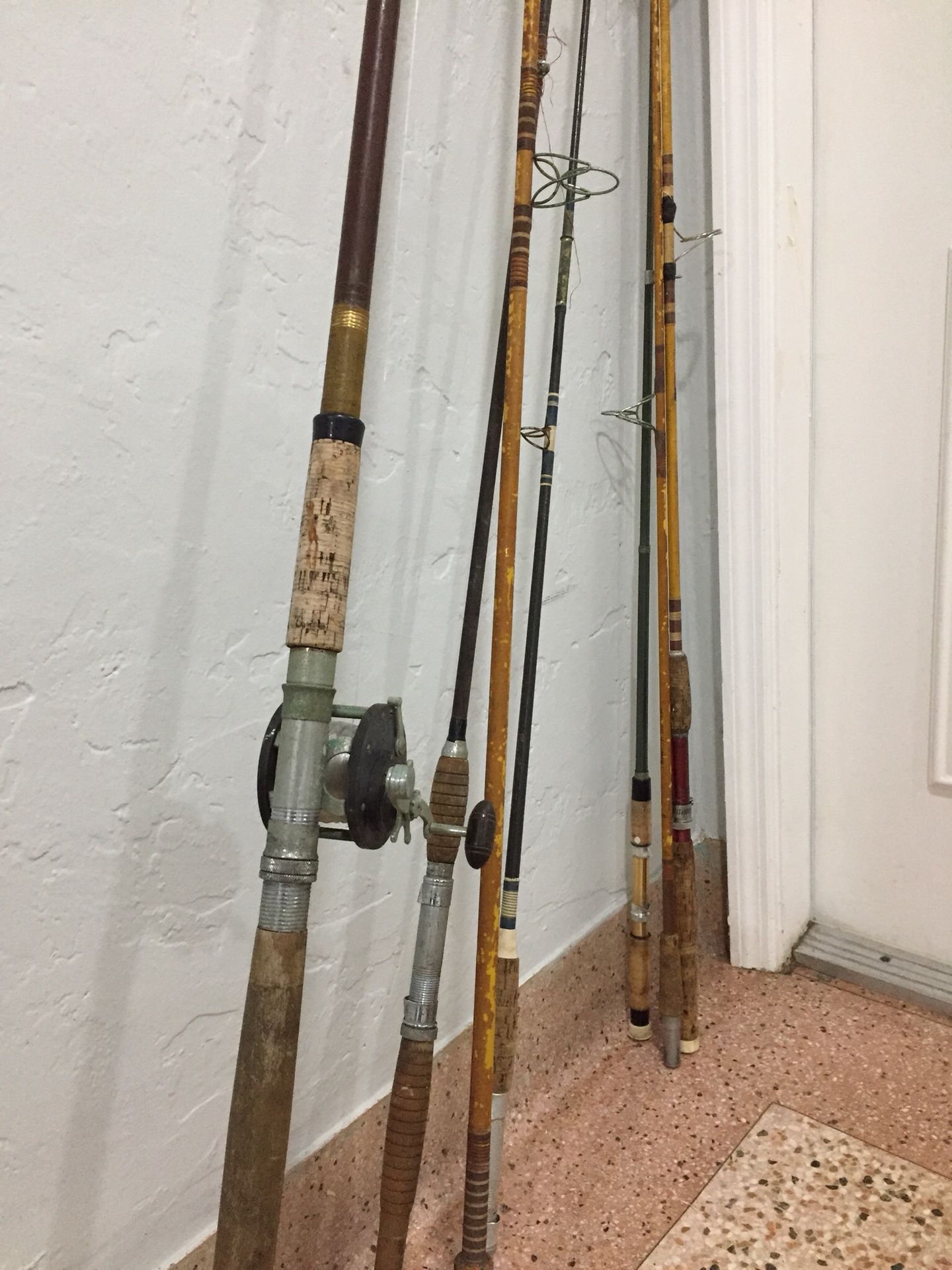 8 Fishing Canes and 1 Reel