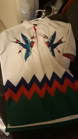 Tommy collar shirt medium Adidas jacket medium champion sweat shit medium Hudson collar shit medium a chargers hat a Van's hat and a tommy hat