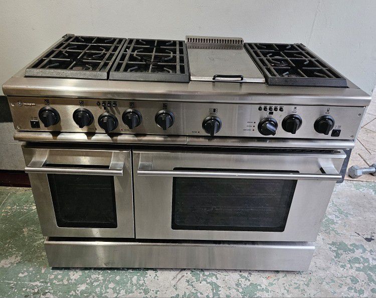 General Electric Double Oven Gas Stove In Good Condition The Top ls Used With Gas The Oven Are Electric 48in Stove $5000