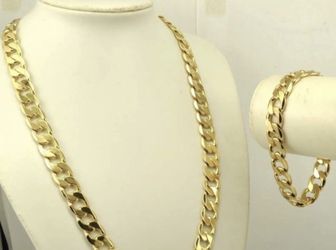 New 18 k yellow gold Cuban chain necklace and bracelet set