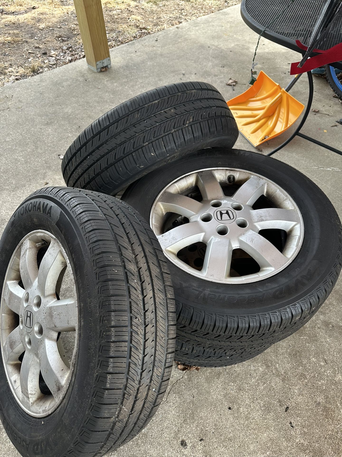 Set of 4 Yokohama AWD tires Mounted On Honda CR-V Rims.