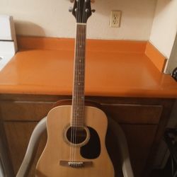 MITCHELL ACOUSTIC GUITAR. BRAND NEW STRINGS. SOUNDS GOOD. NICE SHINE ON GUITAR. 