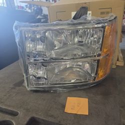 GMC SIERRA 07-13 HEADLIGHTS NEW