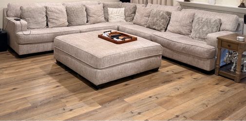 Ashley’s large sectional 133 by 133