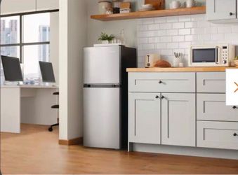 BRAND NEW MINI FRIDGE WITH DOUBLE DOOR SMALL DENT ON THE SIDE