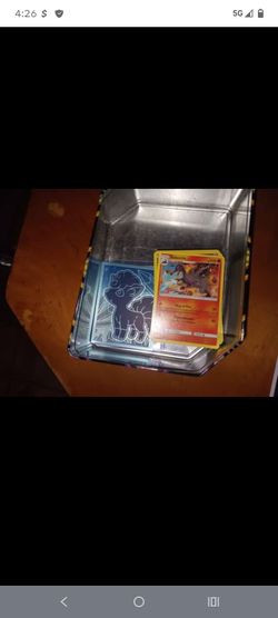 Pokemon cards and incomplete stadium game