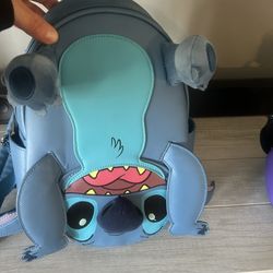 Upside down stitch lounge fly backpack