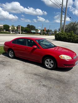 2013 Chevrolet Impala Red 4-Door Sedan