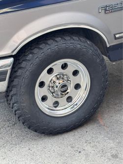 American Racing AR172 Baja 17x8 8x6.5 Rims 285/70R17 A/T Tires 8 lug Trucks 8x165