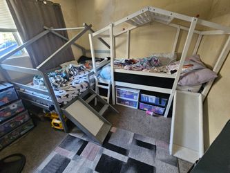 Twin house beds with slides
