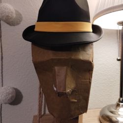 A Mummified Cardboard Mannequin Head