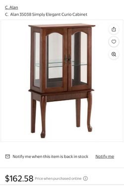 Curio cabinet with back mirror