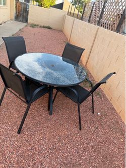 Out door dining table with 4 chairs