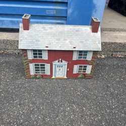 Vintage tin toy house. If listed it’s available 