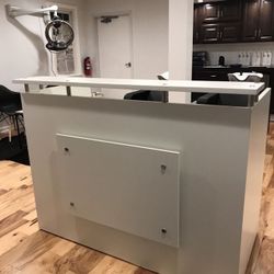 White on white reception desk 60" by 30" .