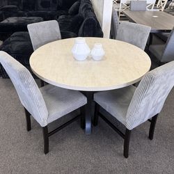 Round dining table with 4 chairs