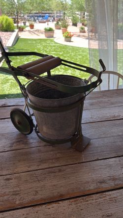 Old wringer mop bucket/ wheels