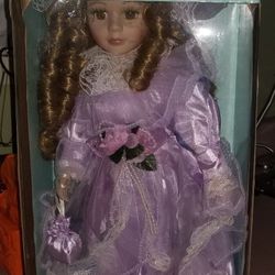 Porcelain Brittany Doll - Collector's Edition - Brand New With Metal Stand