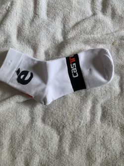 Selling one pair of new cycling sock size large