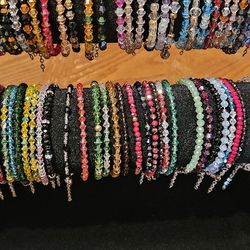 Pulseras  y Aretes