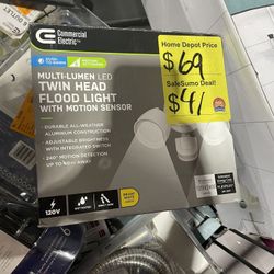 SaleSumo 9' Commercial Electric™ DUSK-TO-DAWN MOTION ACTIVATED MULTI-LUMEN LED TWIN HEAD FLOOD LIGHT WITH MOTION SENSOR