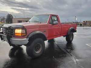 Photo 93 F150 lifted on 35s 4.9 straight 6 5 speed manual transmission sell or trade