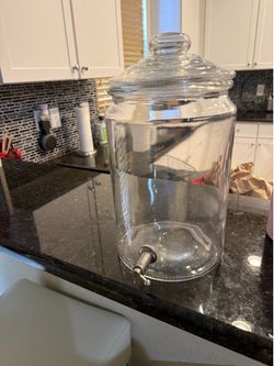 Big glass jar with a spigot