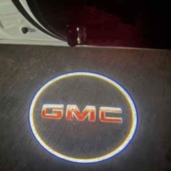 2 GMC Universal Wireless Door Projector Welcome Puddle Lights Aaa Batteries. SHIPPING AVAILABLE