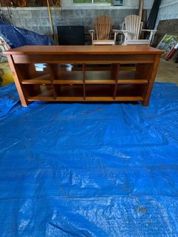 Wood bench with shoe storage cubbies