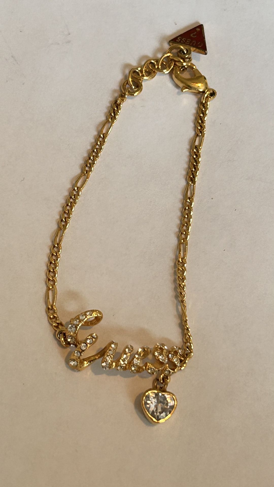 A Beautiful Bracelet With Charm And Rhinestones