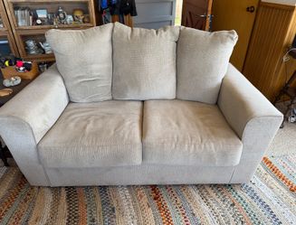 Gray sofa w/attached back cushions