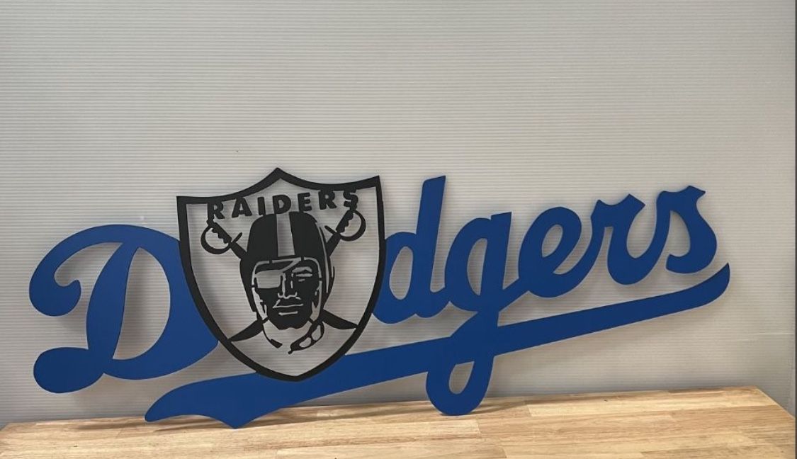 Metal Dodger Raiders Sign 