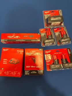 Milwaukee  power tools and batteries and battery  chargers