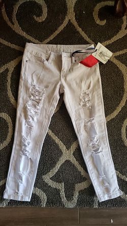 White distressed denim jeans