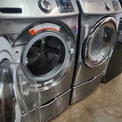 SAMSUNG SET STEAM WASHER AND ELECTRIC DRYER 