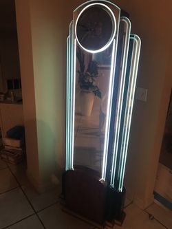Rare floor mirror and watch
