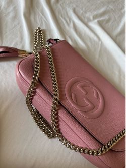 Pink Gucci clutch with chain