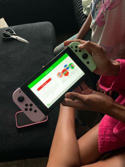 Nintendo Switch with Joy-Con Controllers