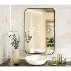24 in. W x 36 in. H Rectangular Aluminum Alloy Framed Rounded Black Wall Mirror