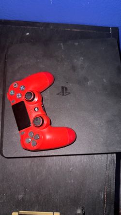 PS4 slim with a controller