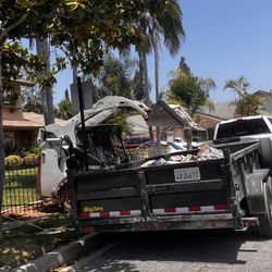 Bobcat And Dump Trailer