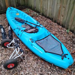 Emotion 10 foot Kayak, paddle, carrier