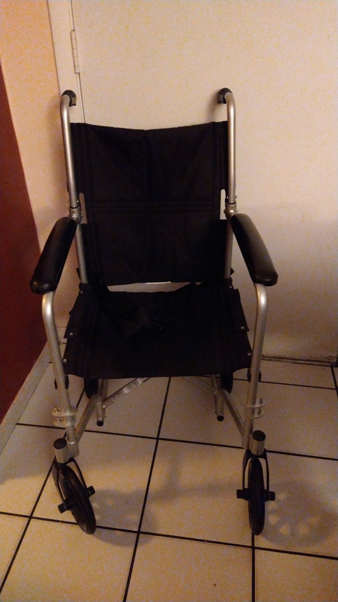 Transport wheelchair