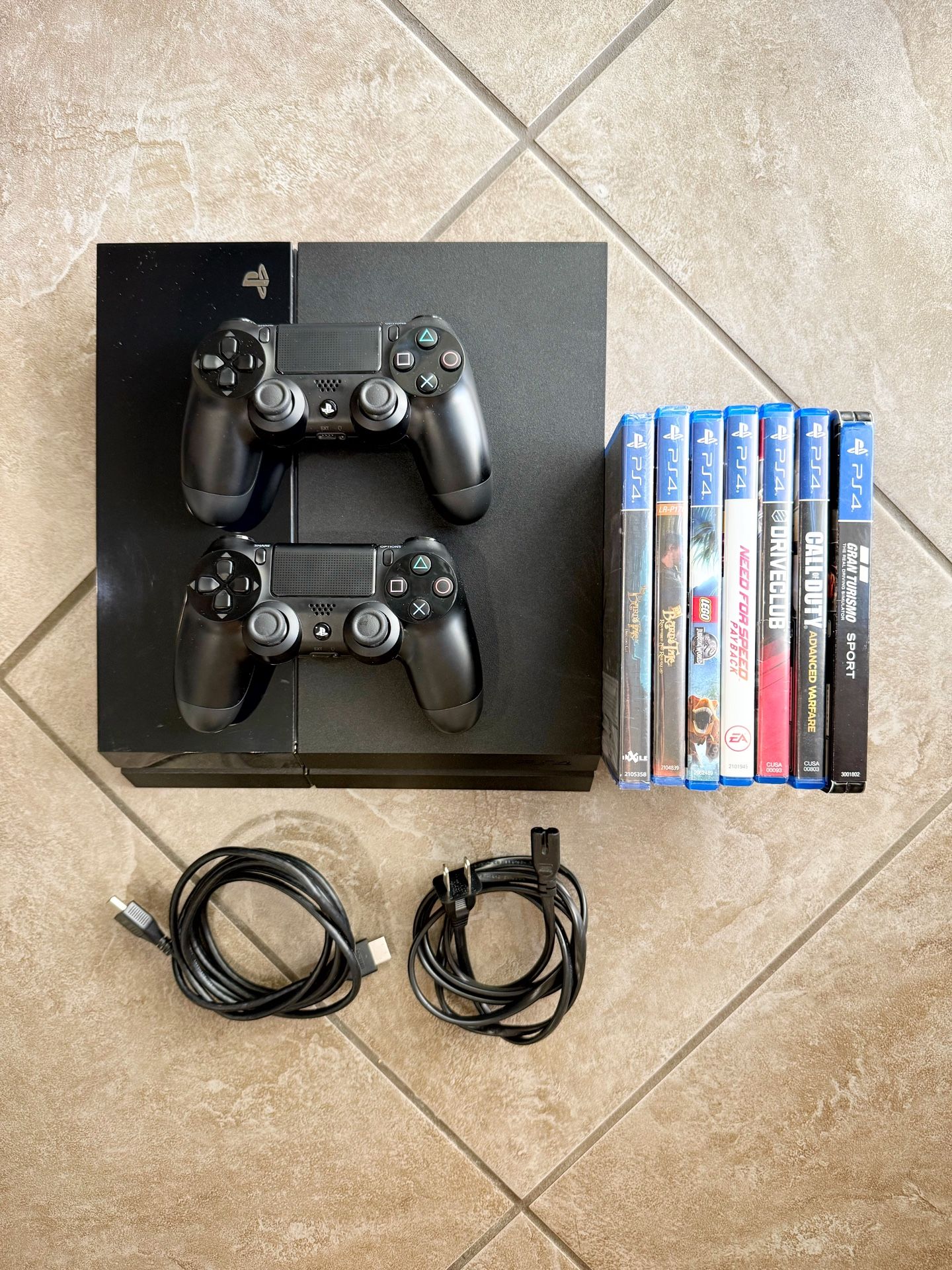 PlayStation 4 (PS4) with 500 GB Hard Drive + Multiple Games